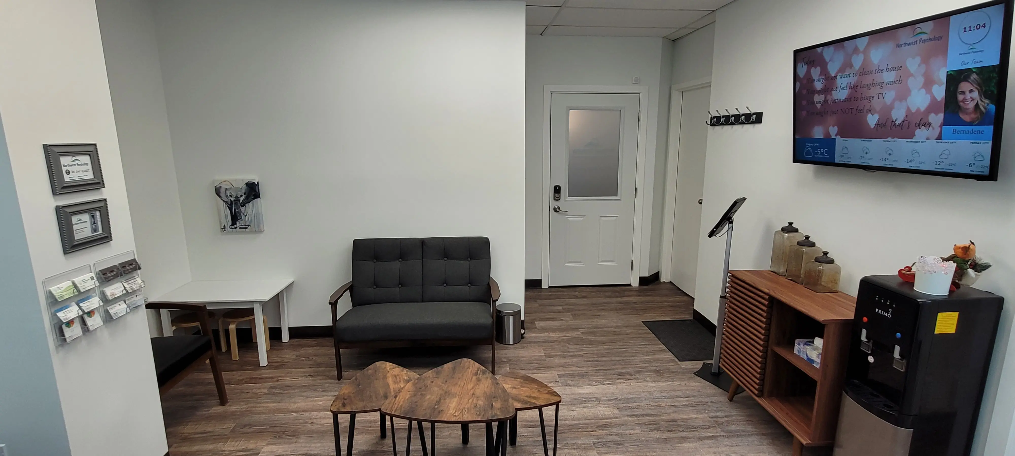 comfortable waiting room and large tv with messages and fun quizzes and entertainment to keep clients happy